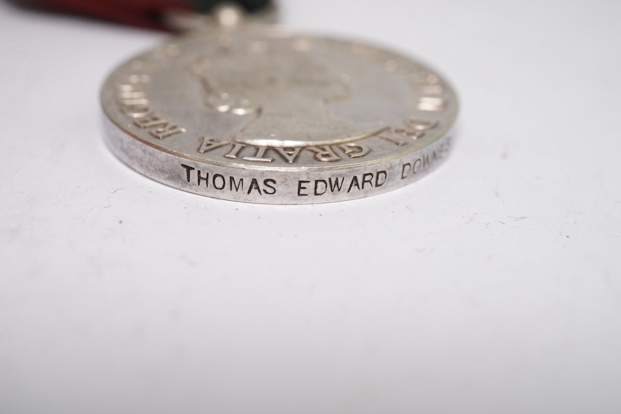 Four assorted Service medals; Vict unnamed Volunteer Long Service medal; GV Colonial Auxiliary Forces Long Service medal (disc only) to E.S.Ware; ERII ISM to Thomas Edward Downes; ERII ISM to William Henry Sharratt. Cond